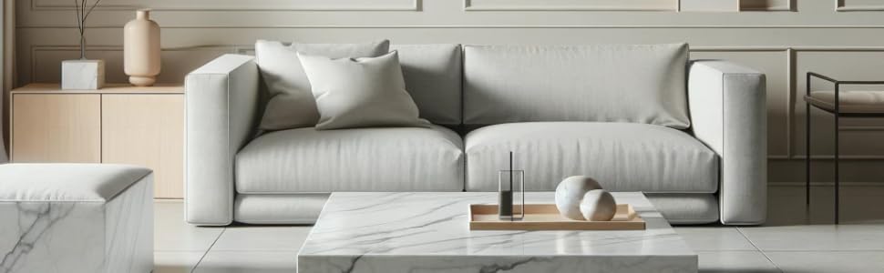a beautifully decorated living room with marble decor